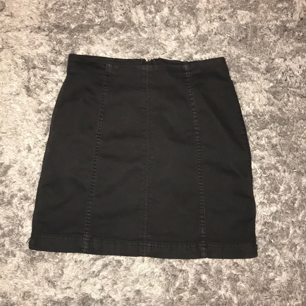 A tight black skirt. Never wore!